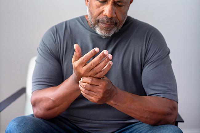 Man suffering from arthritis in his wrist